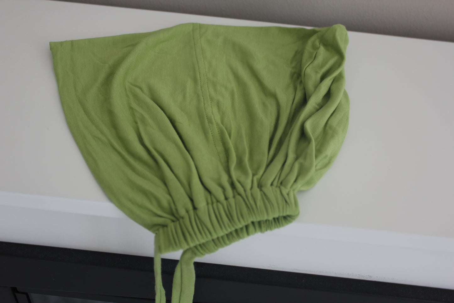 Bone - under headscarf