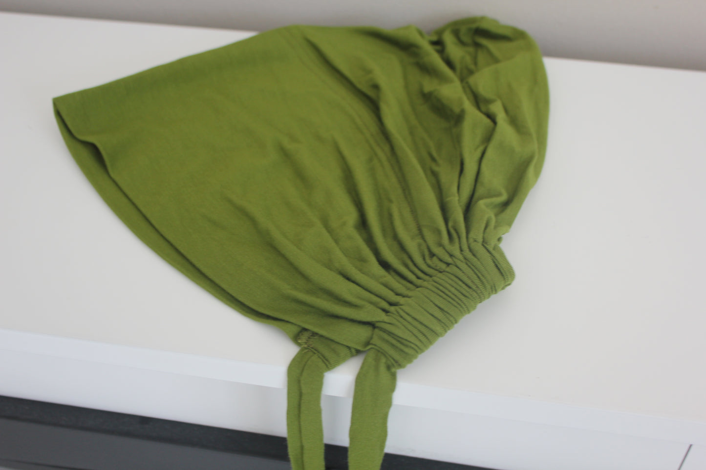 Bone - under headscarf
