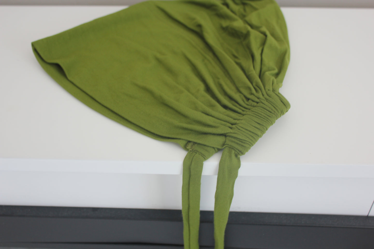 Bone - under headscarf