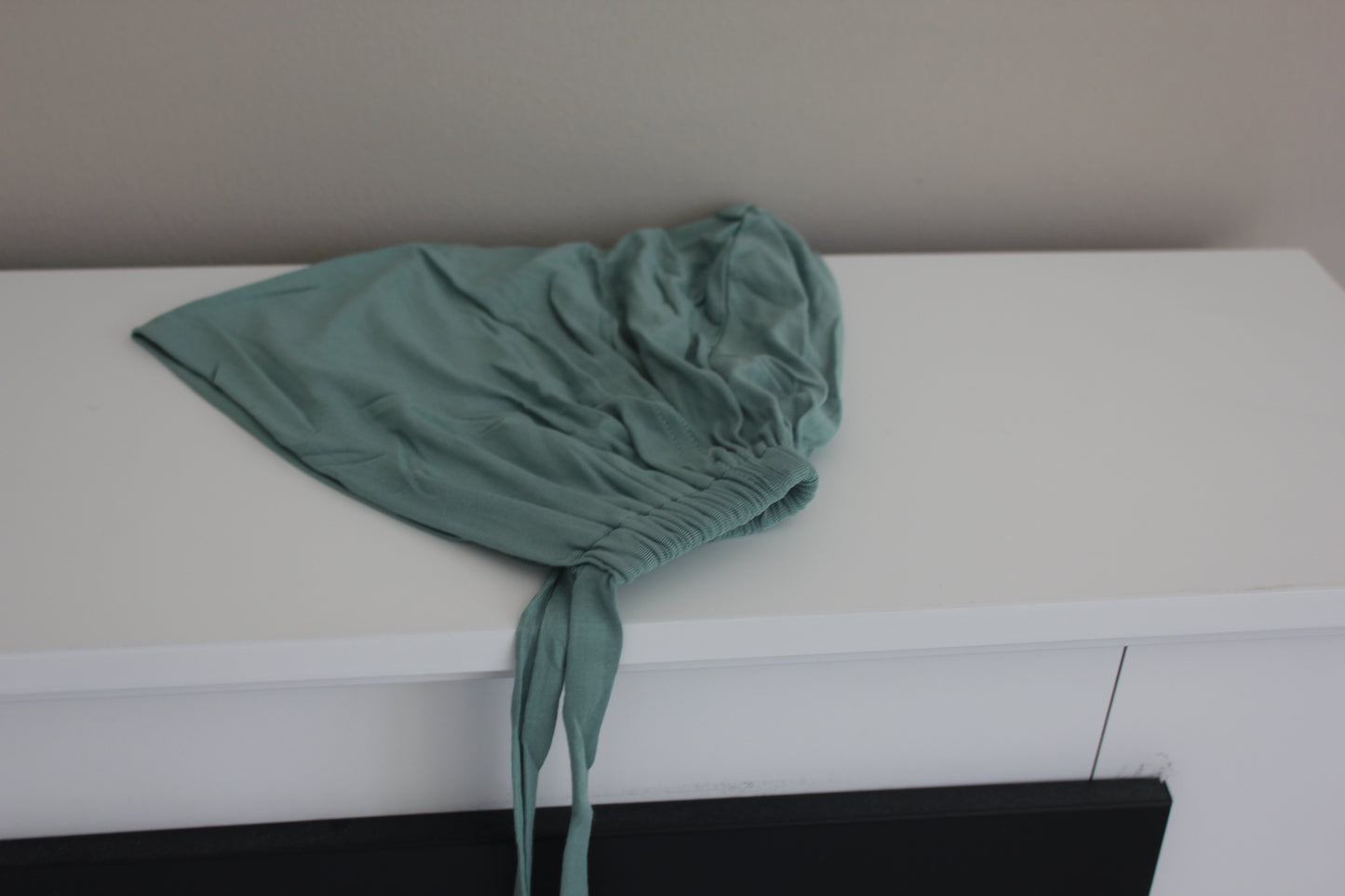 Bone - under headscarf